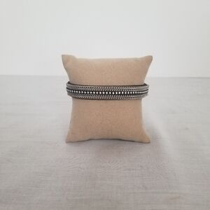 Yik Fung Leather beaded bracelet.